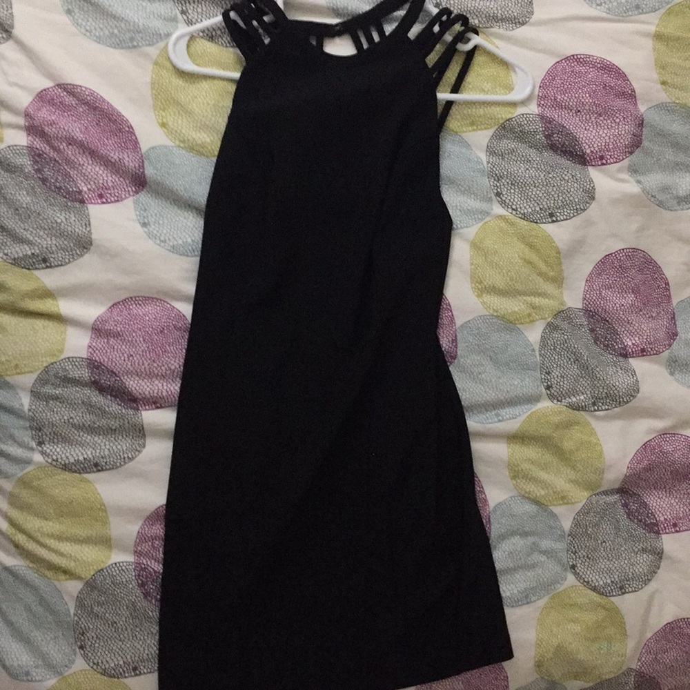 LBD bodycon style with strappy back design
